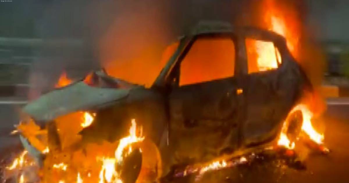 Speeding car overturns, catches fire on highway; 2 sustain minor burns